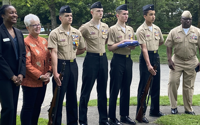 Mayor Matthews, Penny Tardona, and the Kitsap High School NJROTC Color Guard with OSCS (SW) Harold Vickers
