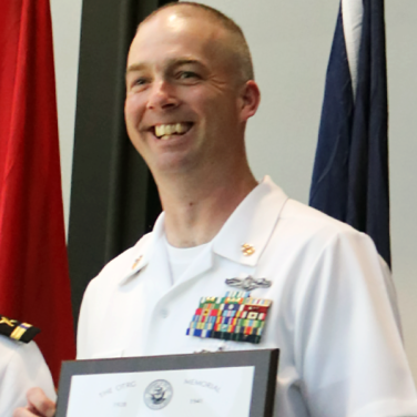 Presented to CTTCS(IW/SW/EXW) Matthew Ballard, USN