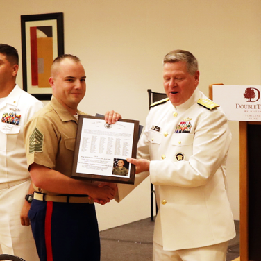 Presented to MSGT Kenneth R. Phillips, Jr., by RADM Daniel J. MacDonnell, Deputy Chief, Central Security Service, National Security Agency