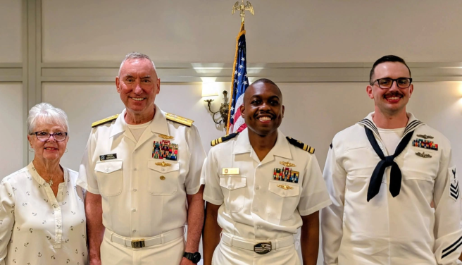 Penny Tardona, US NCVA Executive Director, and VADM Berg congratulate LCDR Grey and CTM1 Utter on their award selections