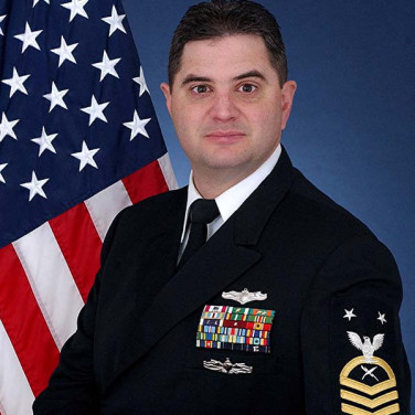 Presented to CTRCM(IDW/SW) James D. Eaton