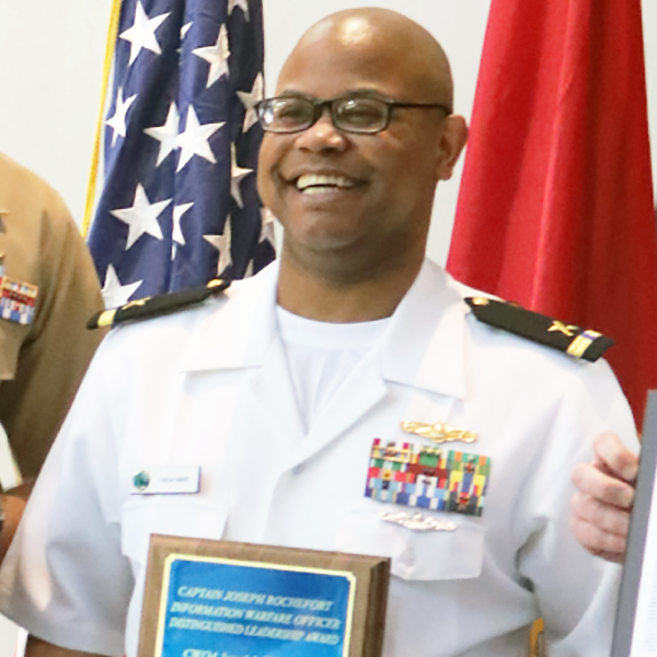 Presented to CWO4 Jarvis J. Ware, USN